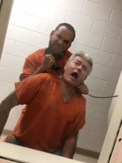 Rick Roberts being choked by Ron James.JPG
